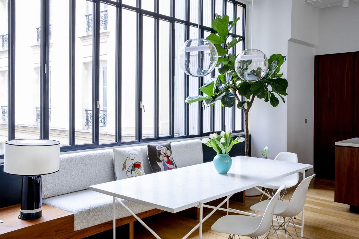salle à manger avec verrière appartement loft à Paris