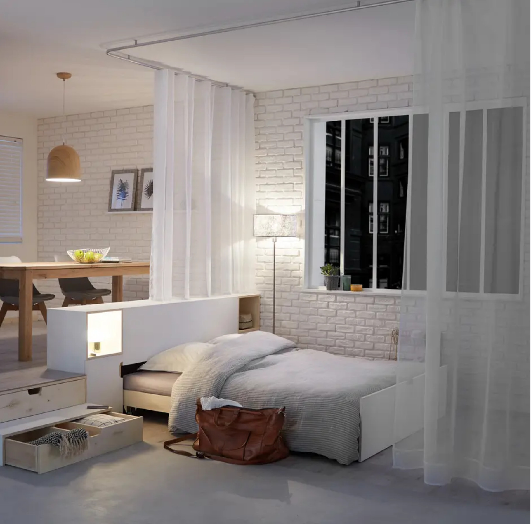 salon avec lit escamotable sous estrade