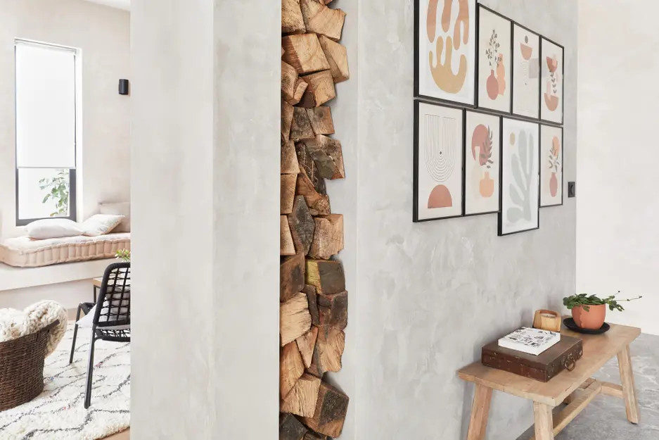 mur de séparation avec range bûches double face