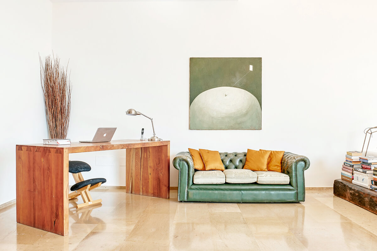 salon avec canapa Chesterfield vert salon avec canapa Chesterfield vert