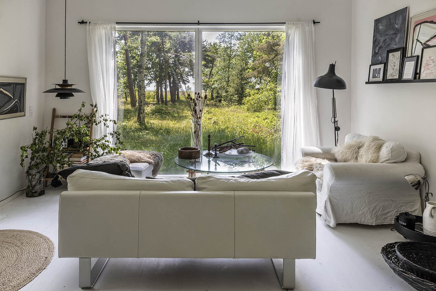 salon avec baie vitrée petite maison 65m2