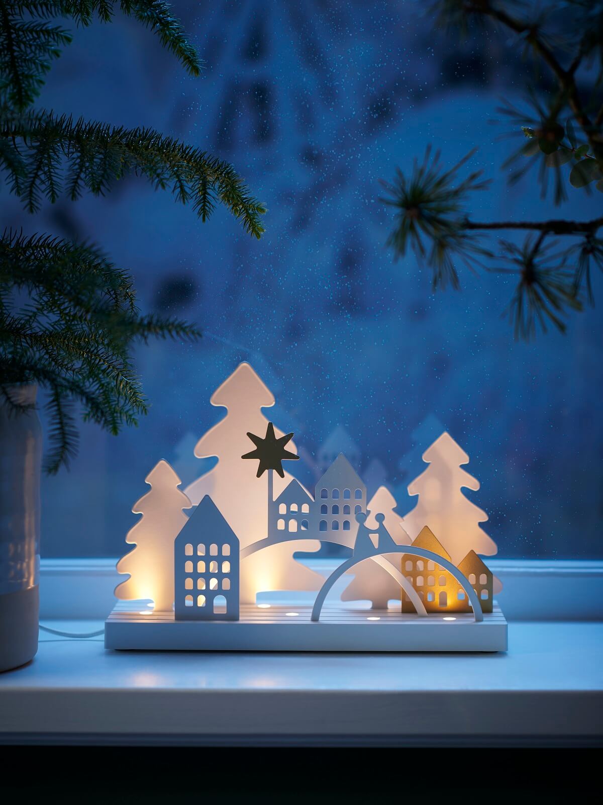 photophore village sous la neige