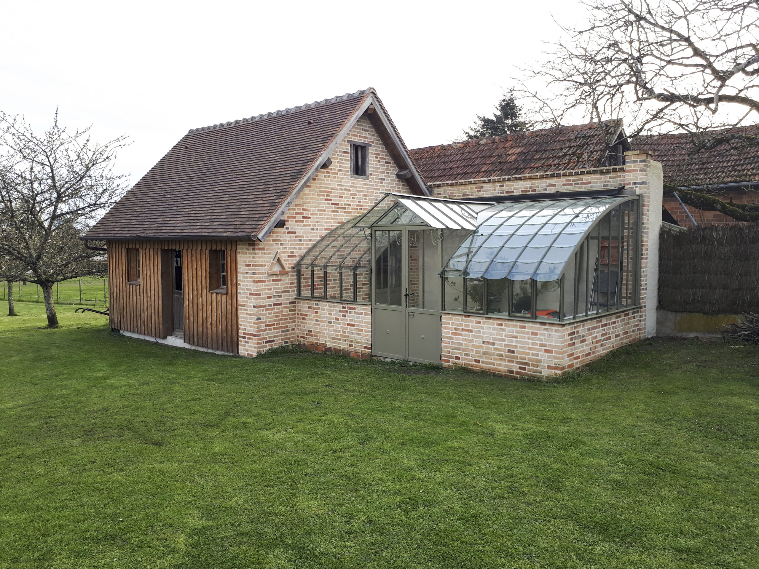 maison en briques avec serre accolée maison en briques avec serre accolée