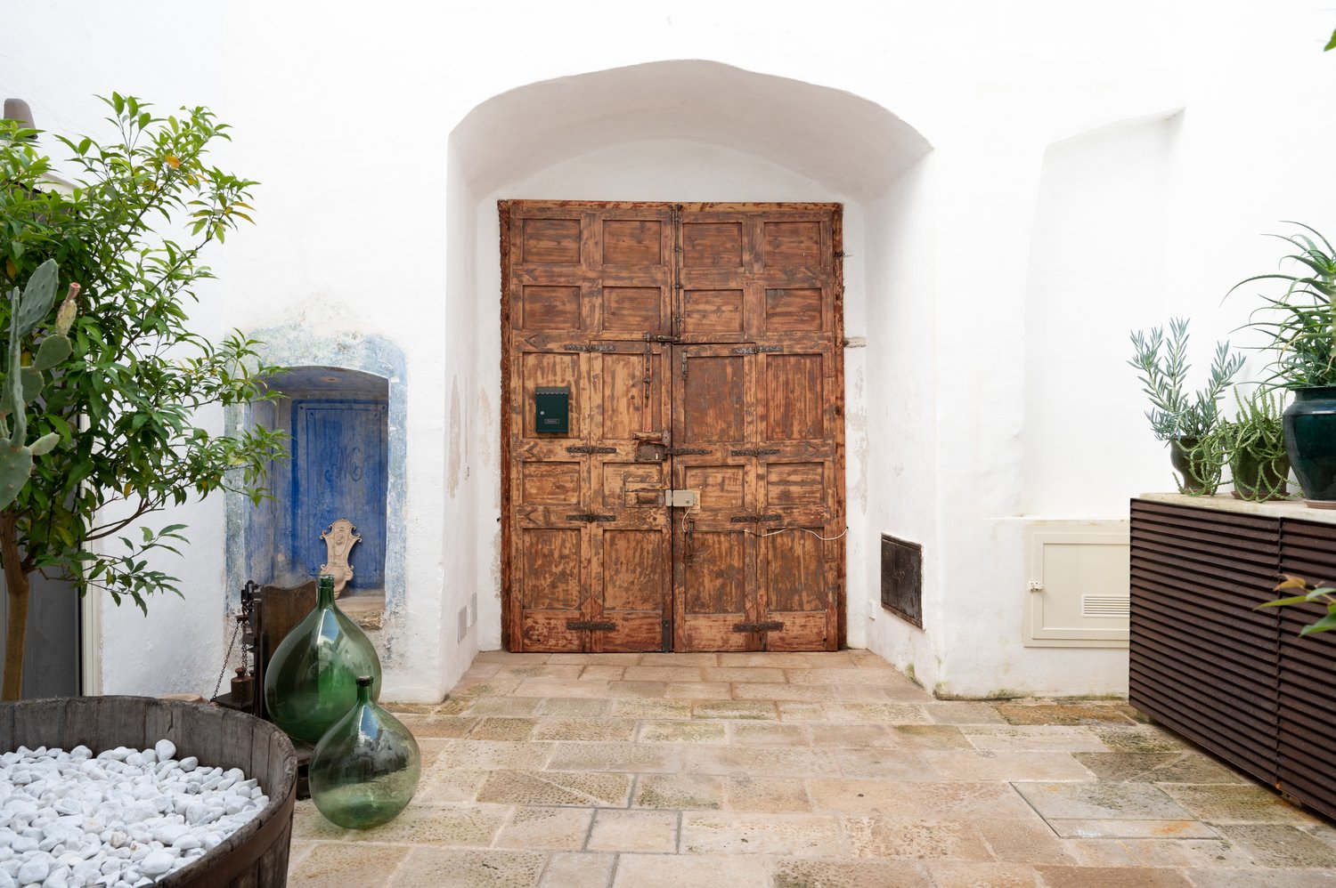 porte entrée maison rustique et élégante Pouilles