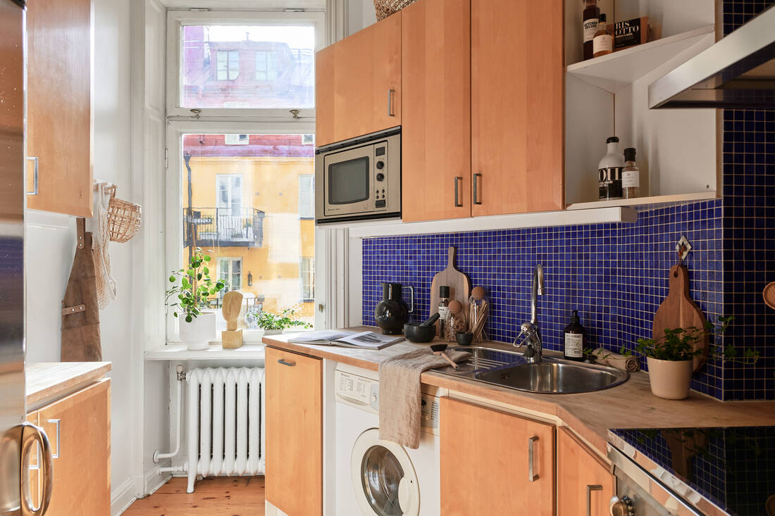 cuisine bois carrelage bleu studio 38m2 décoration scandinave