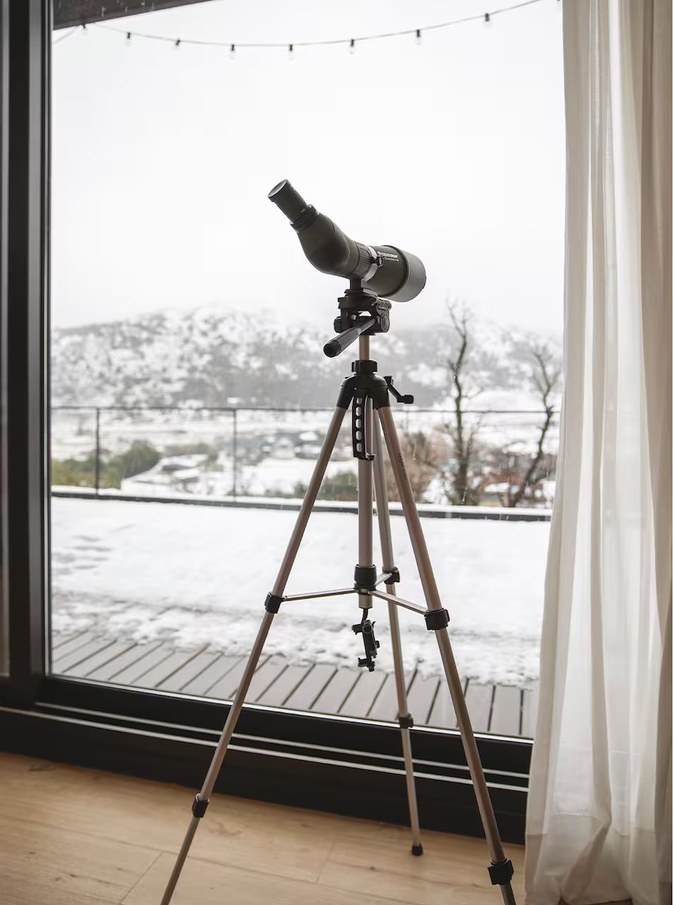 télescope devant baie vitrée télescope devant baie vitrée