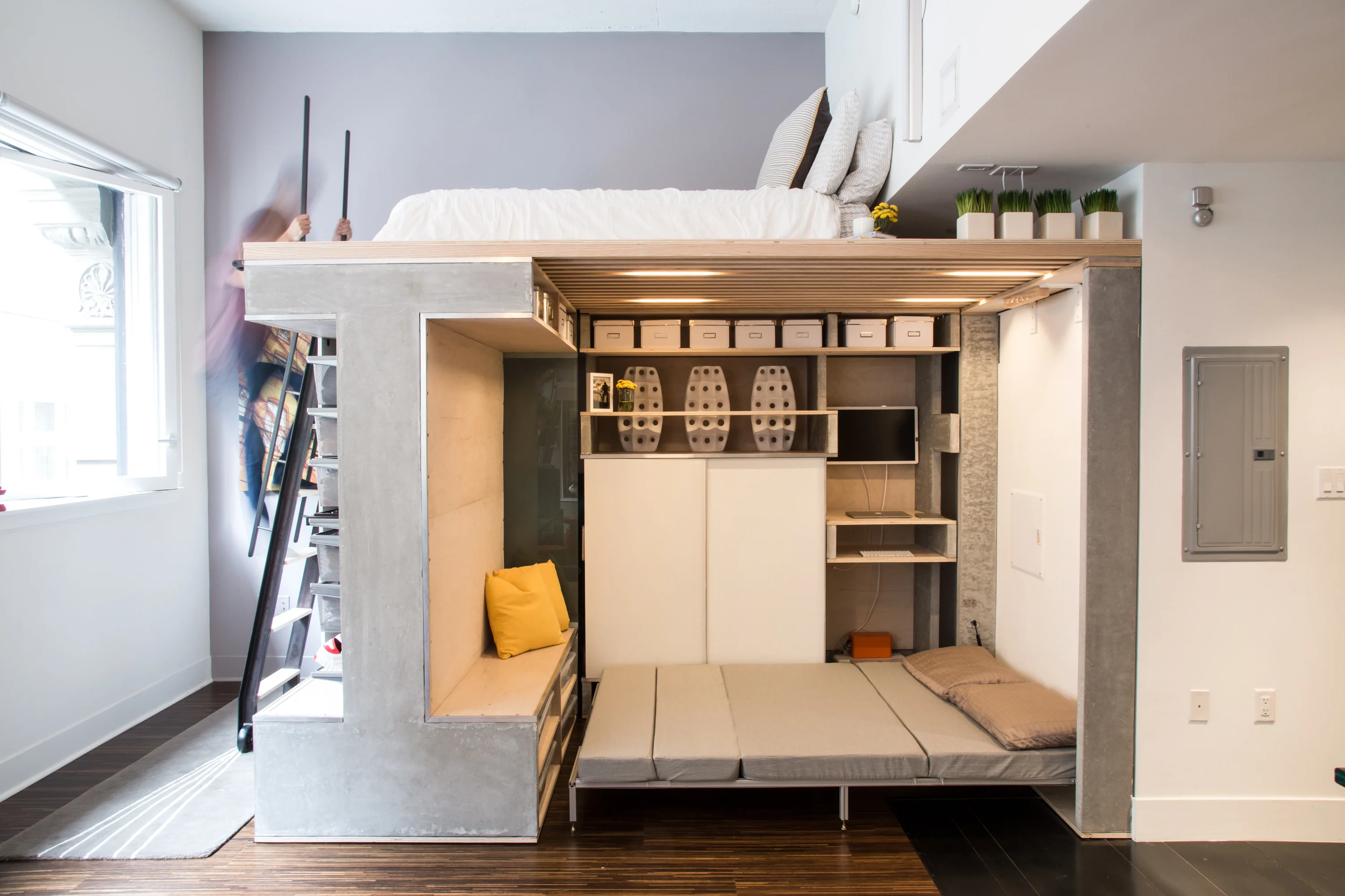 aménagement salon petit appartement design avec lit armoire