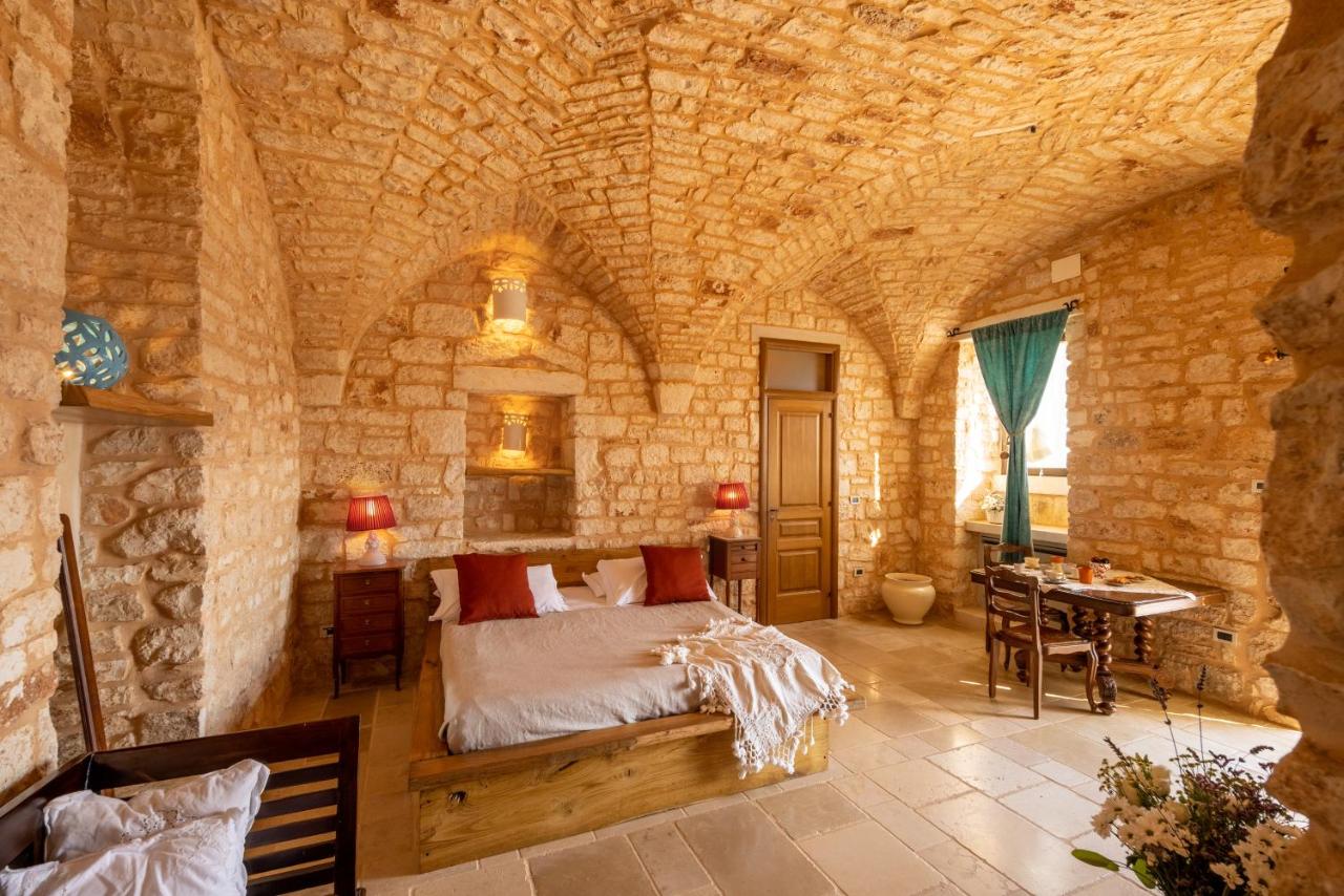 chambre avec arches maison en pierres Pouilles chambre avec arches maison en pierres Pouilles