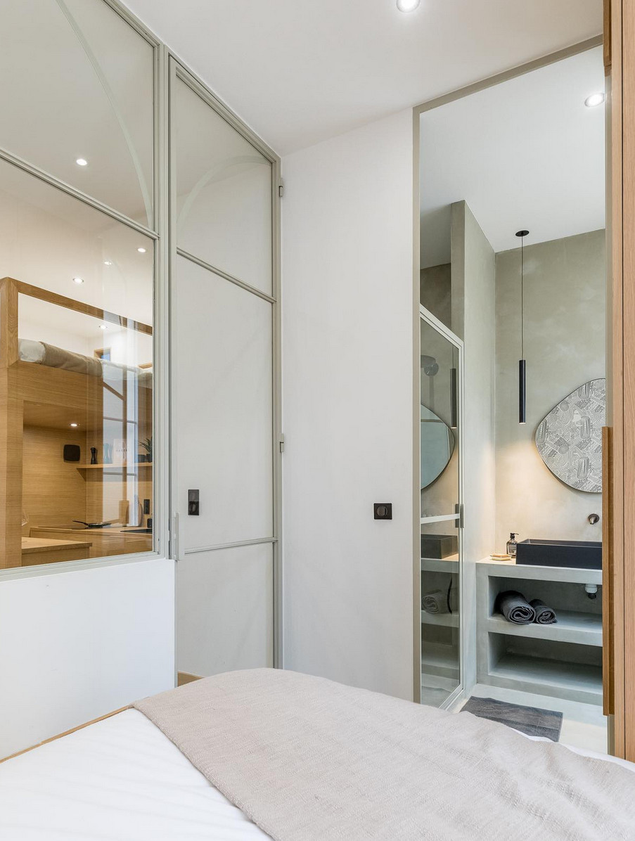 chambre avec verrière et salle de bain appartement de 30m2