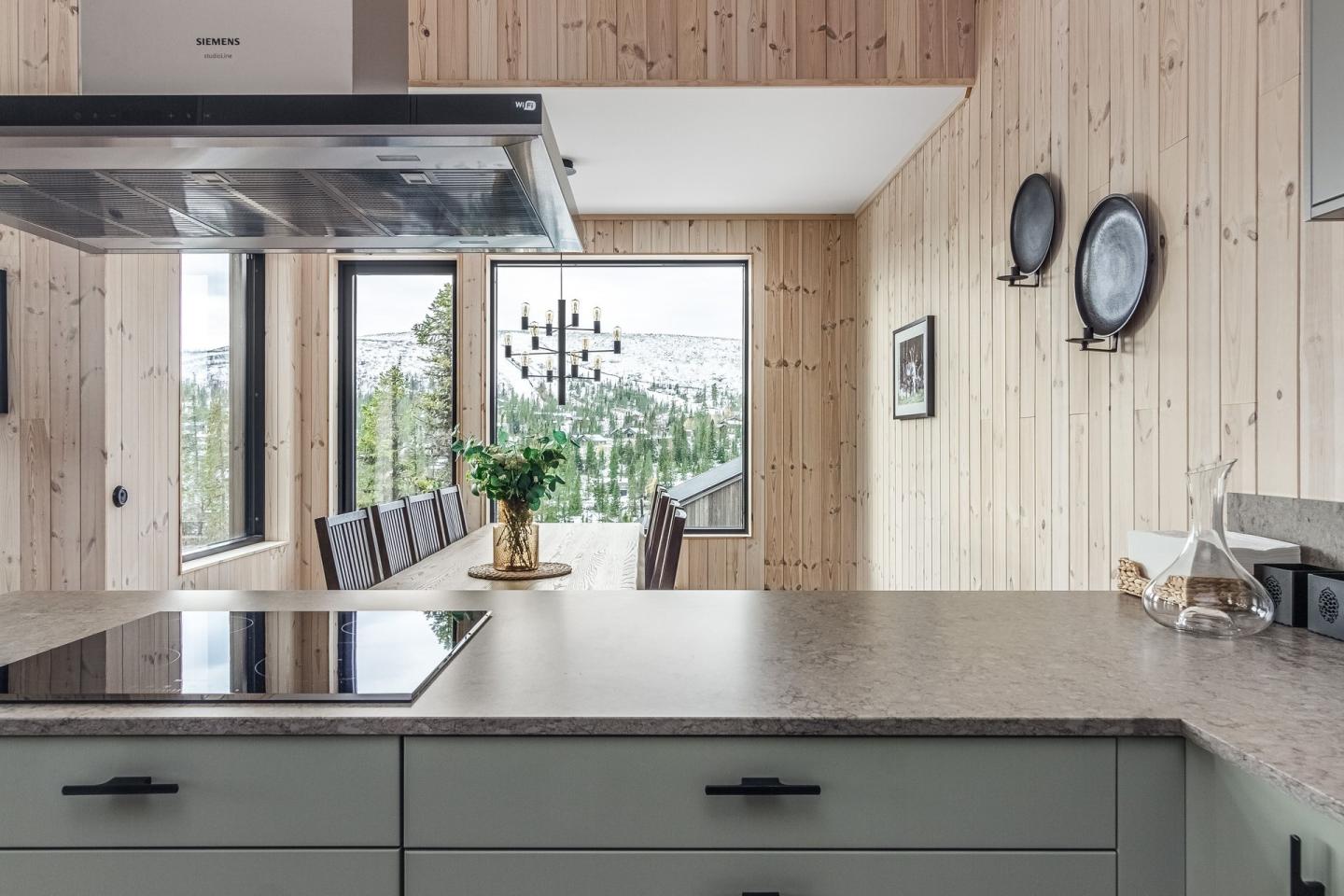 salon et cuisine mur en bois clair maison montagne salon et cuisine mur en bois clair maison montagne