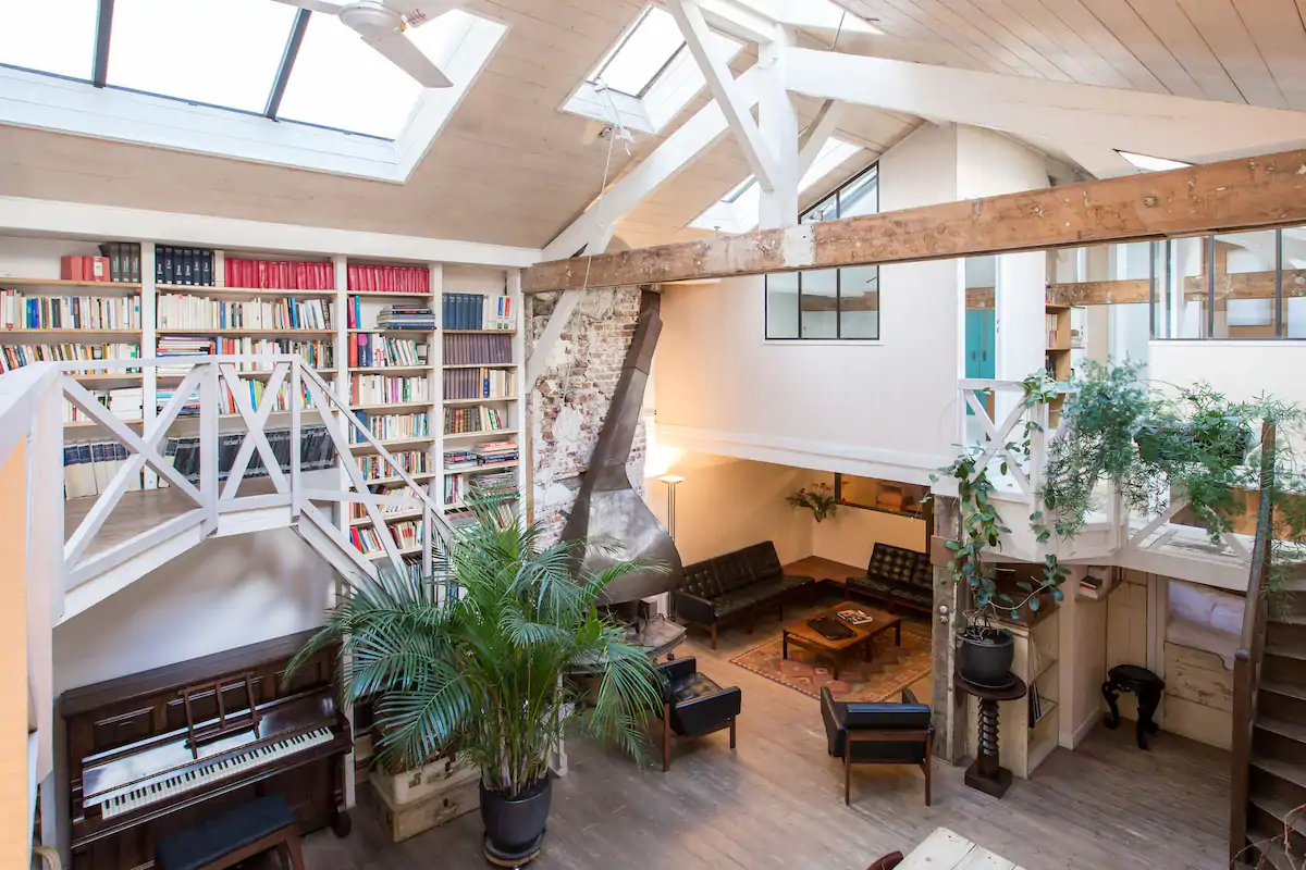 salon double hauteur maison de ville loft Paris