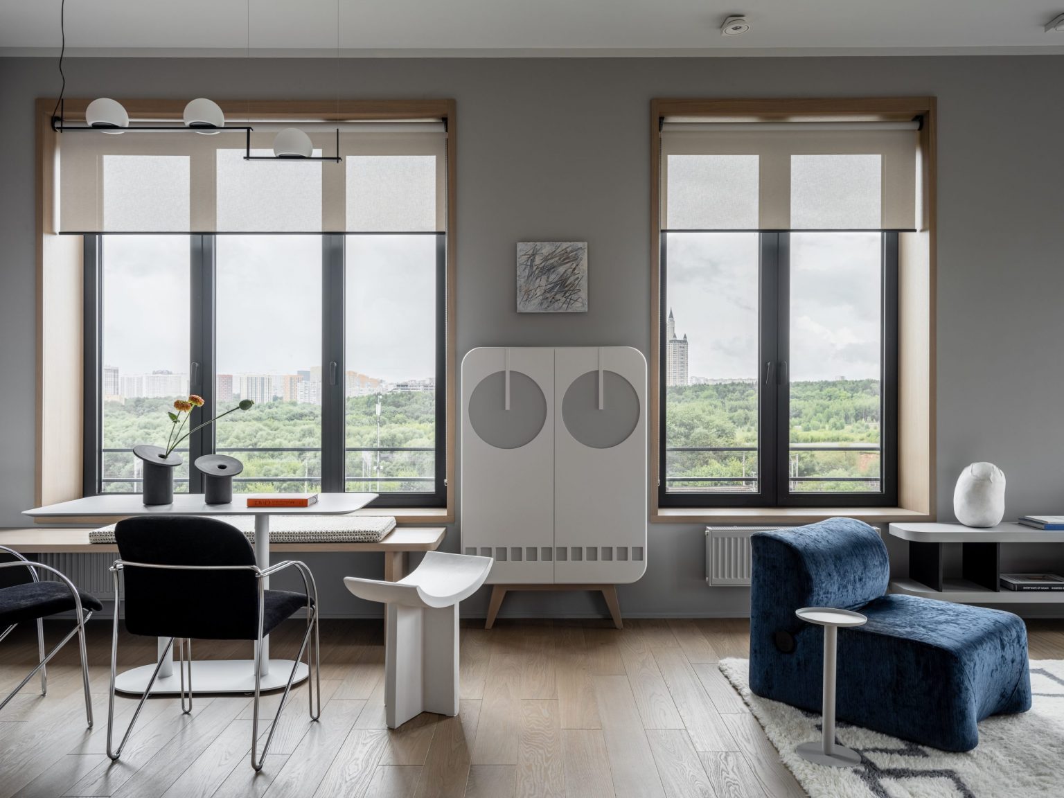 salon avec cuisine ouverte blanche décoration design