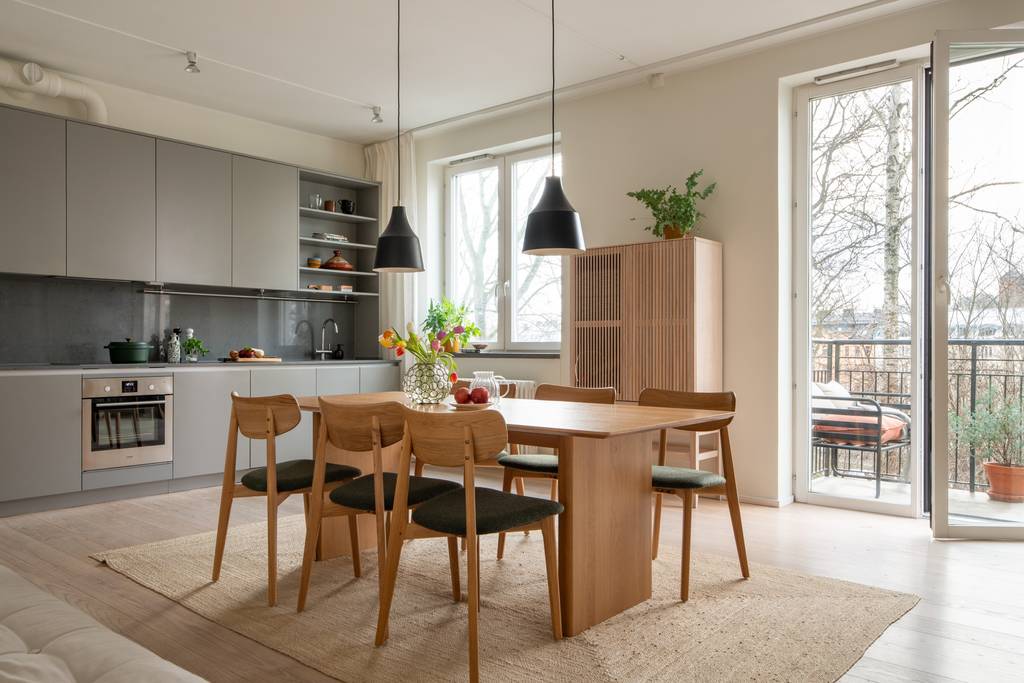 salle à manger et cuisine ouverte appartement 107m2