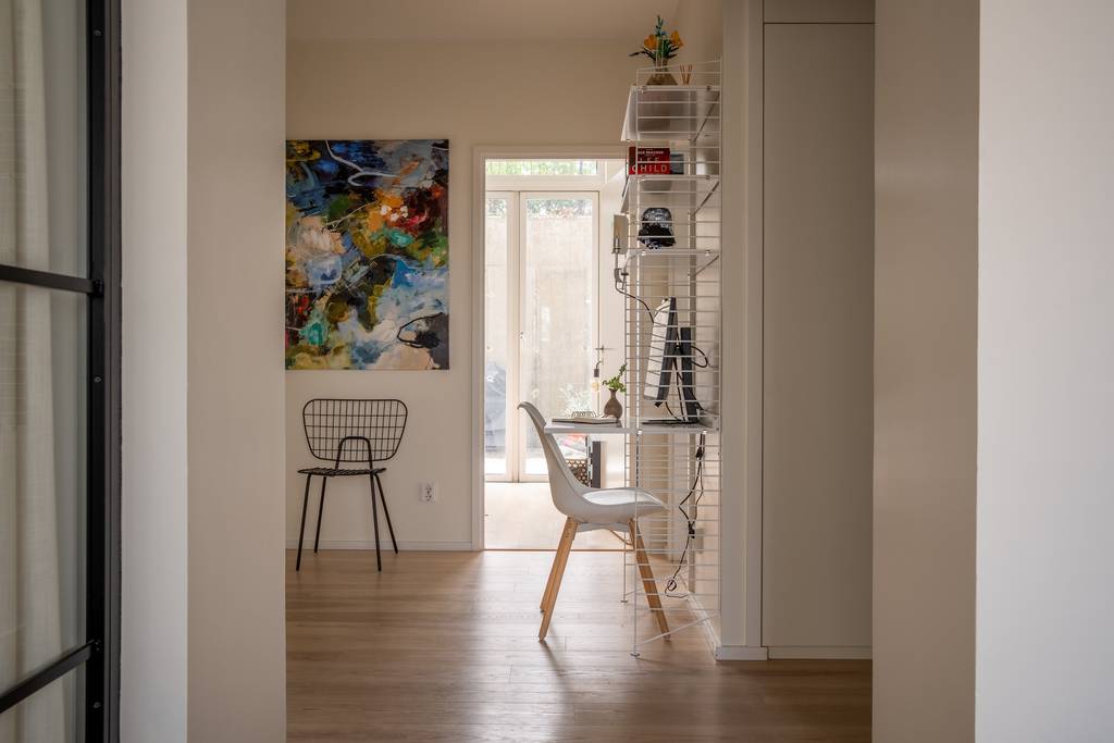 entrée avec verrière noire appartement 107m2