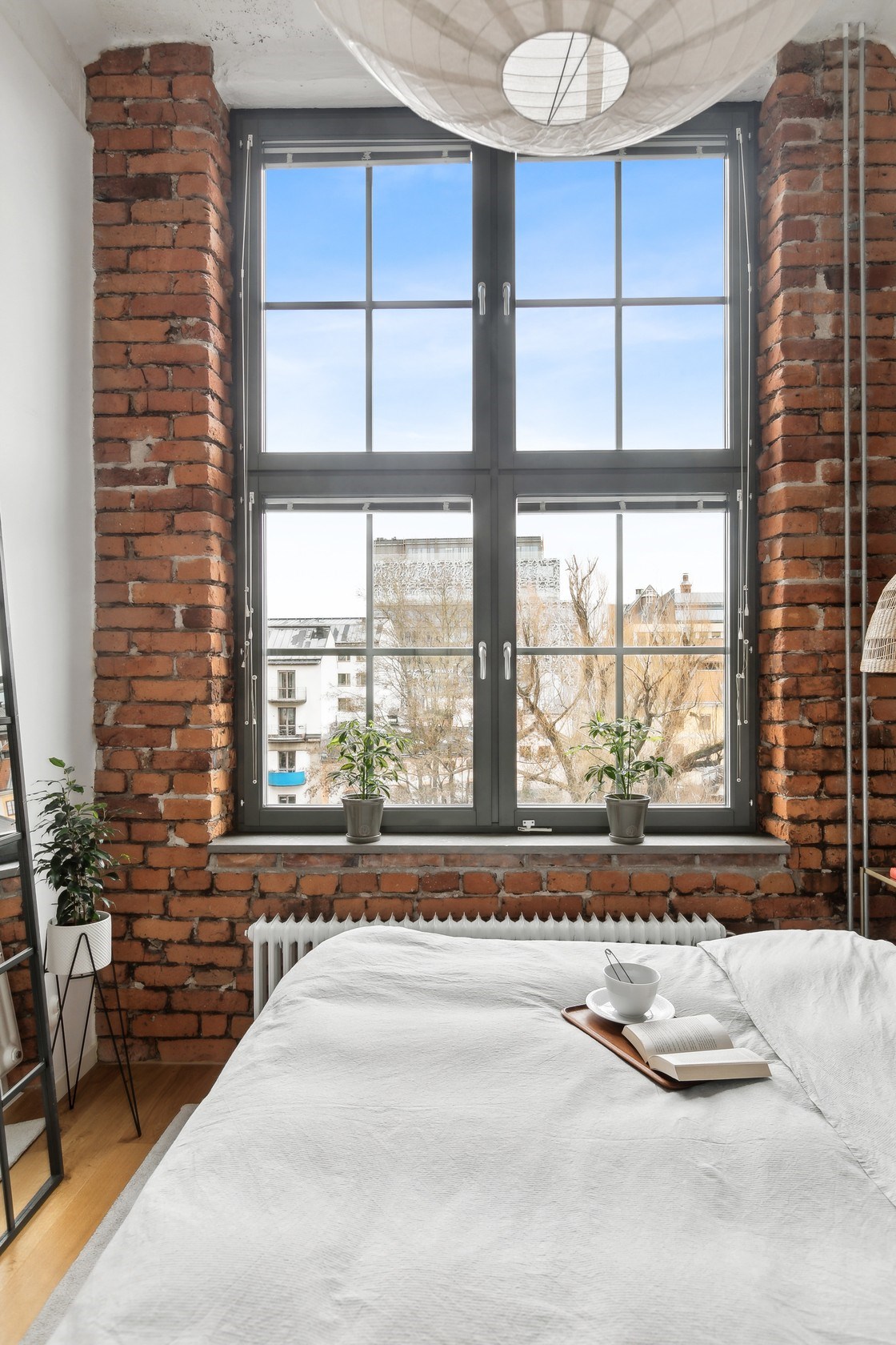 chambre mur briques deux-pièces 54m2 mini loft