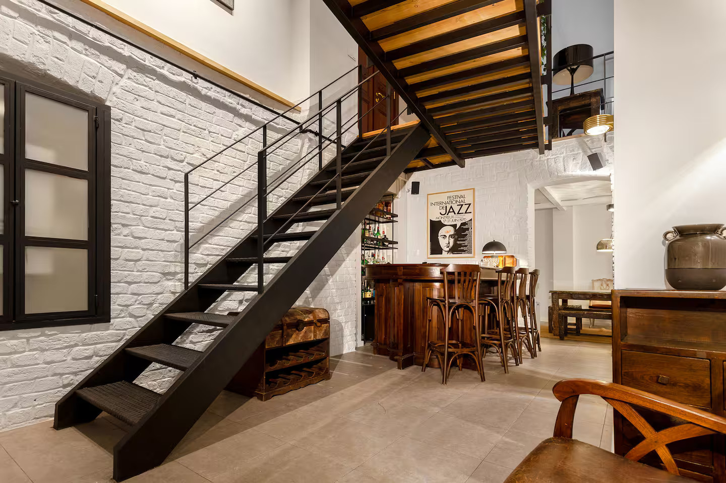 Un appartement type loft sur deux niveaux rénové par un architecte