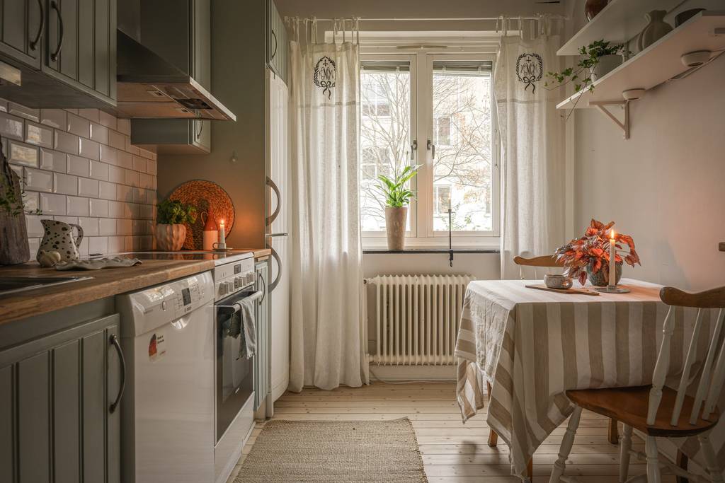 cuisine décoration verte et beige deux-pièces de 50m2 cuisine décoration verte et beige deux-pièces de 50m2