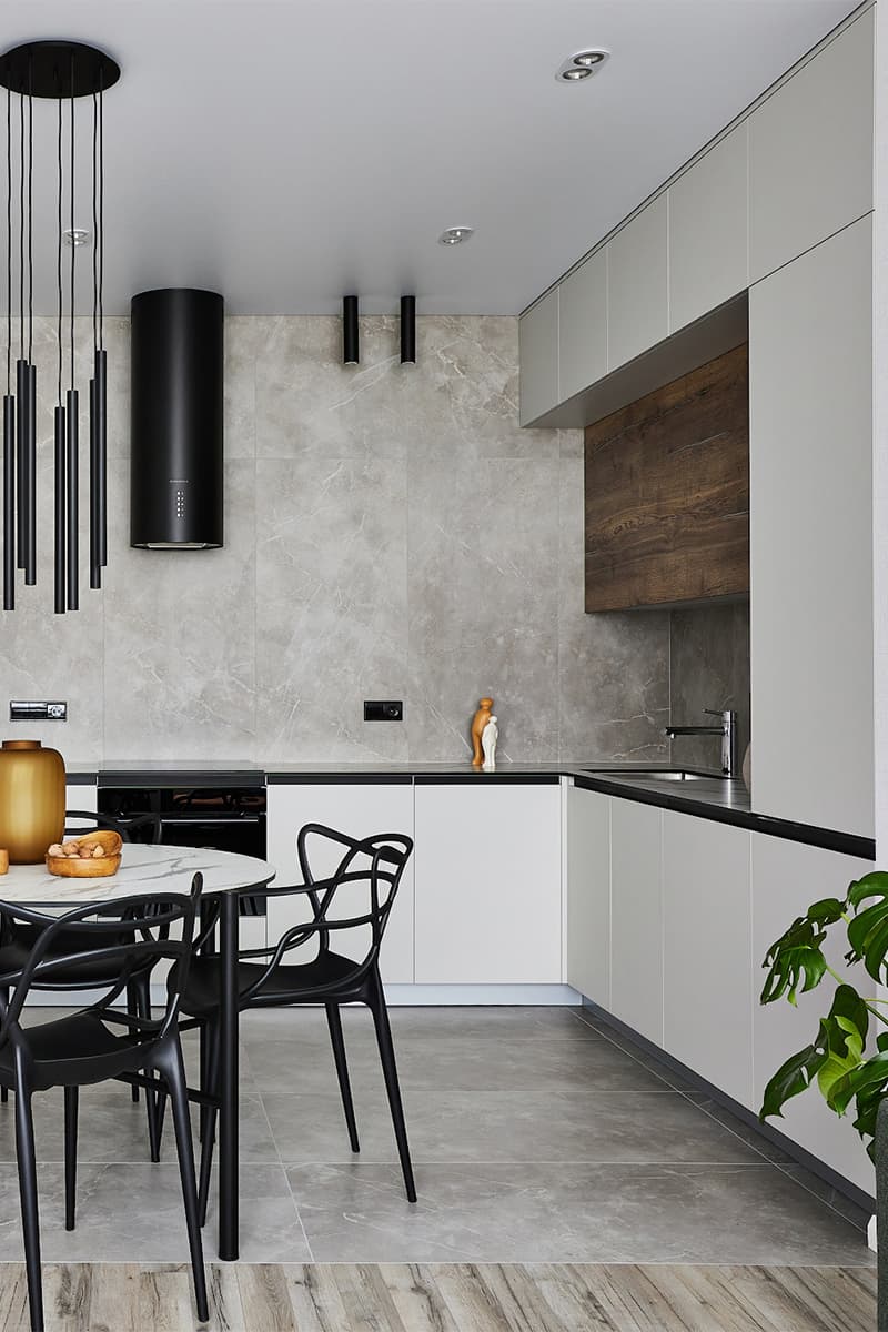 cuisine blanche en angle ouverte et salle à manger design deux-pièces 51m2