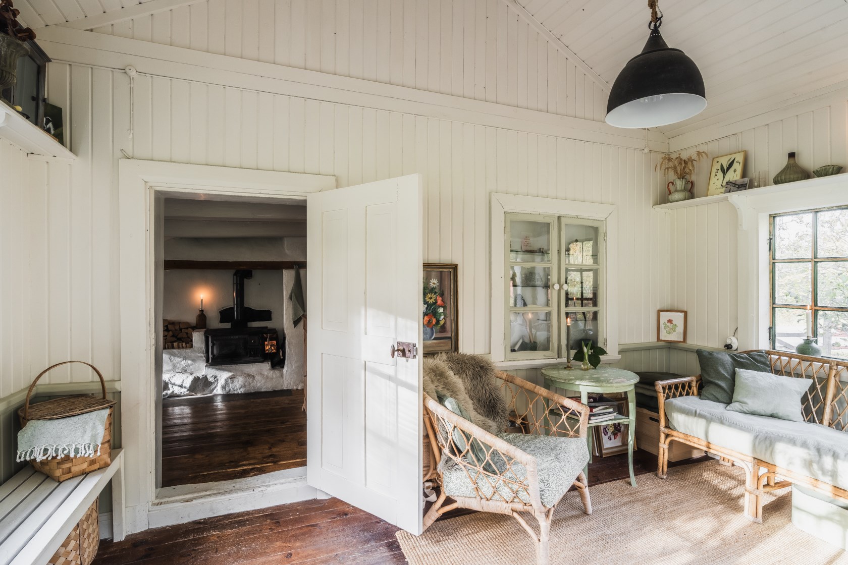 salon dans véranda petite maison 42m2 en bois Suède salon dans véranda petite maison 42m2 en bois Suède