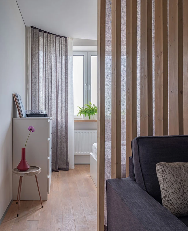 salon et chambre avec claustra bois appartement 39m2 décoration contemporaine