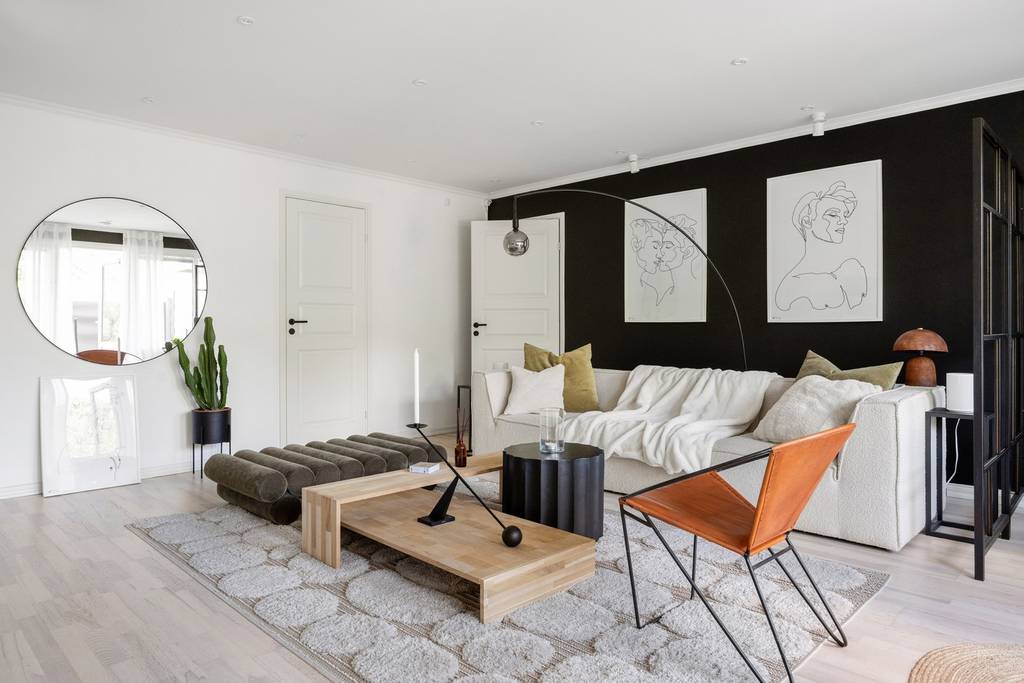 salon mur noir décoration design et scandinave appartement deux-pièces 68m2 salon mur noir décoration design et scandinave appartement deux-pièces 68m2