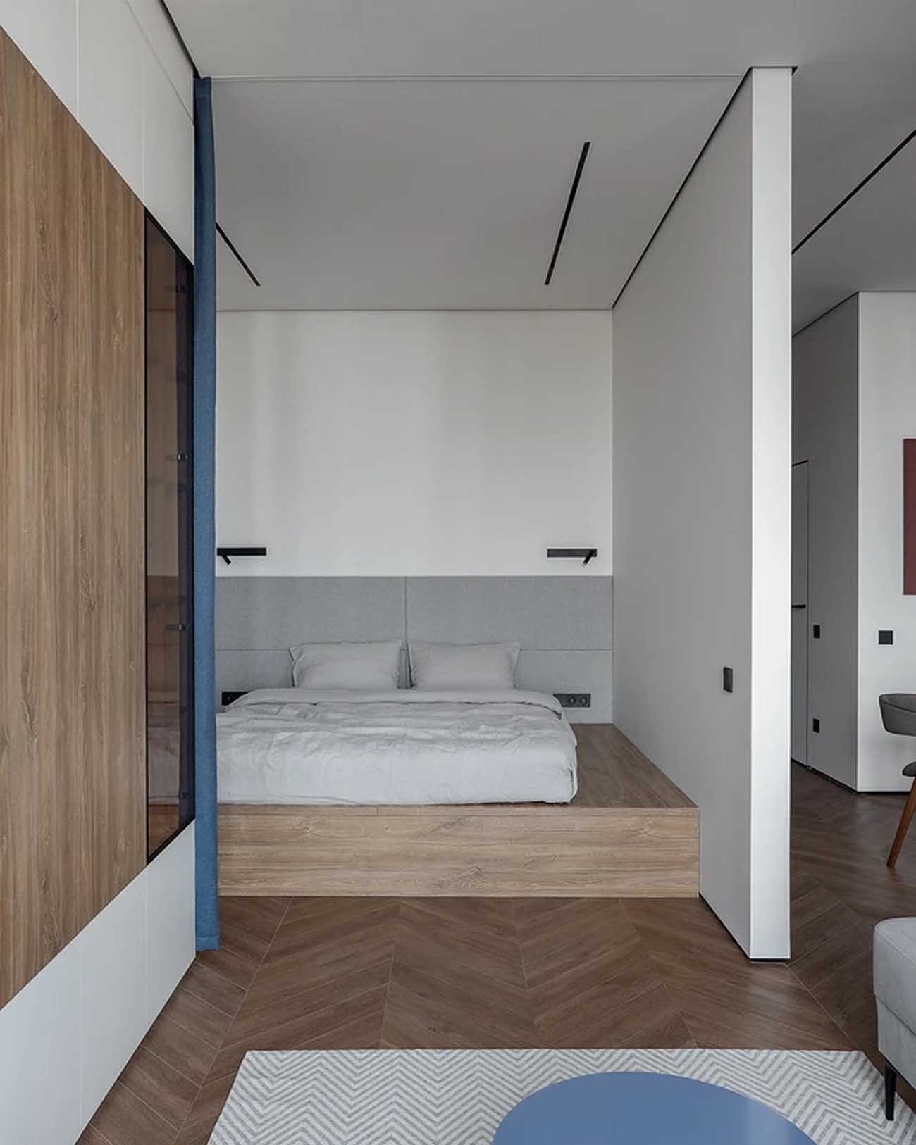 espace chambre sur estrade fermé par un rideau grand studio 47m2 avec dressing décoration contemporaine espace chambre sur estrade fermé par un rideau grand studio 47m2 avec dressing décoration contemporaine