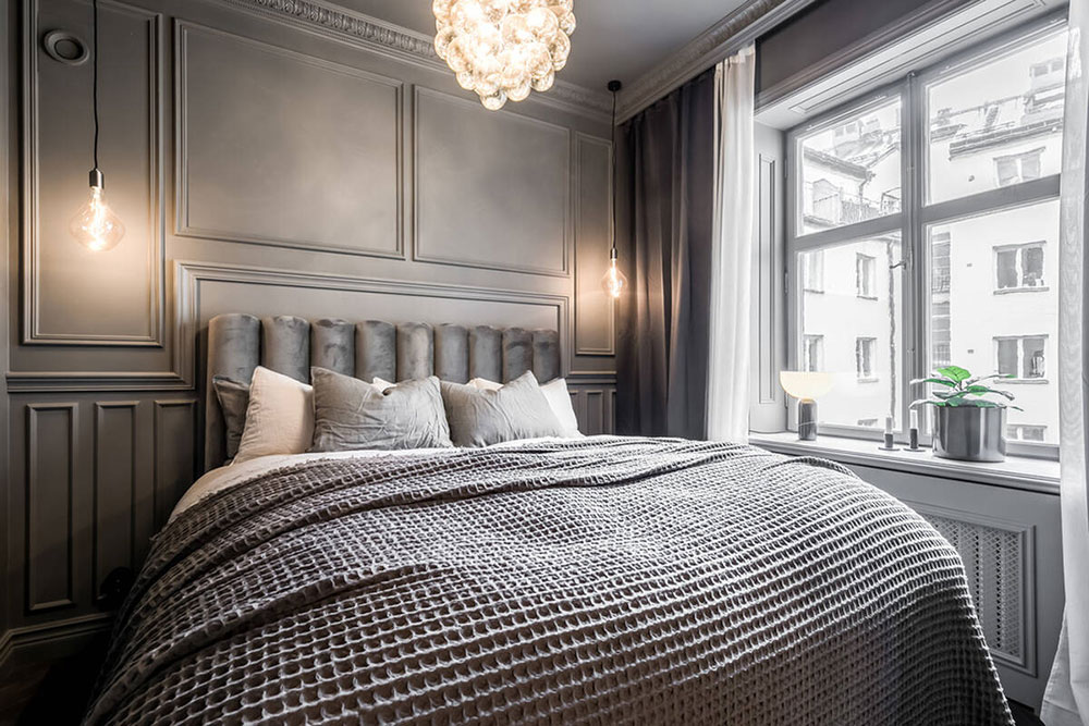 chambre avec moulures anciennes décoration grise scandinave et contemporaine deux-pièces 39m2