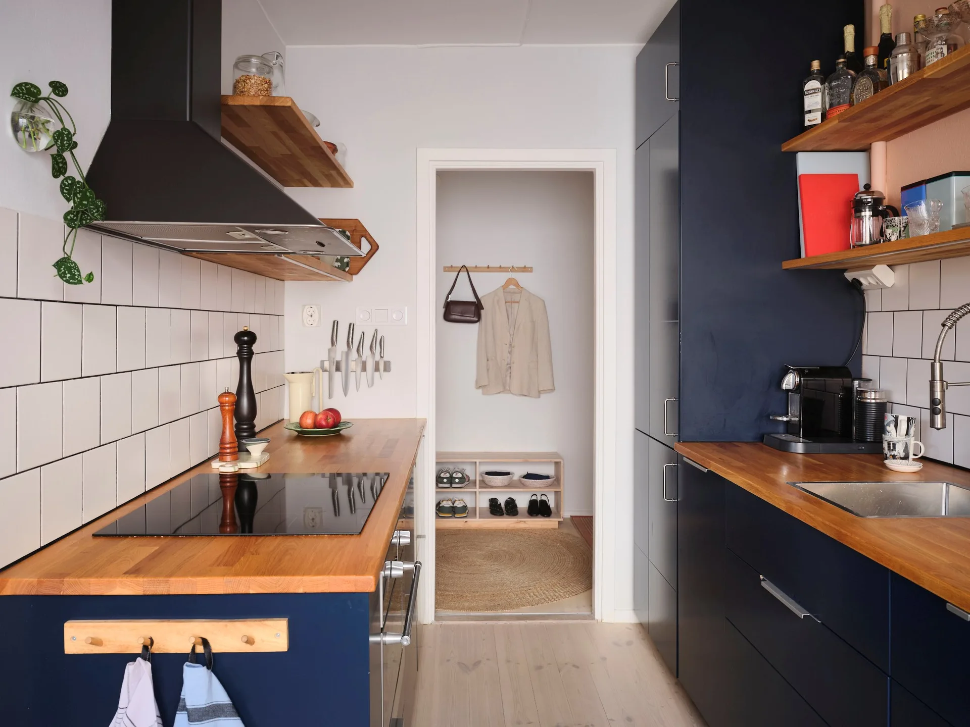 Semi-open blue kitchen, colourful 54m2 Scandinavian-style flat