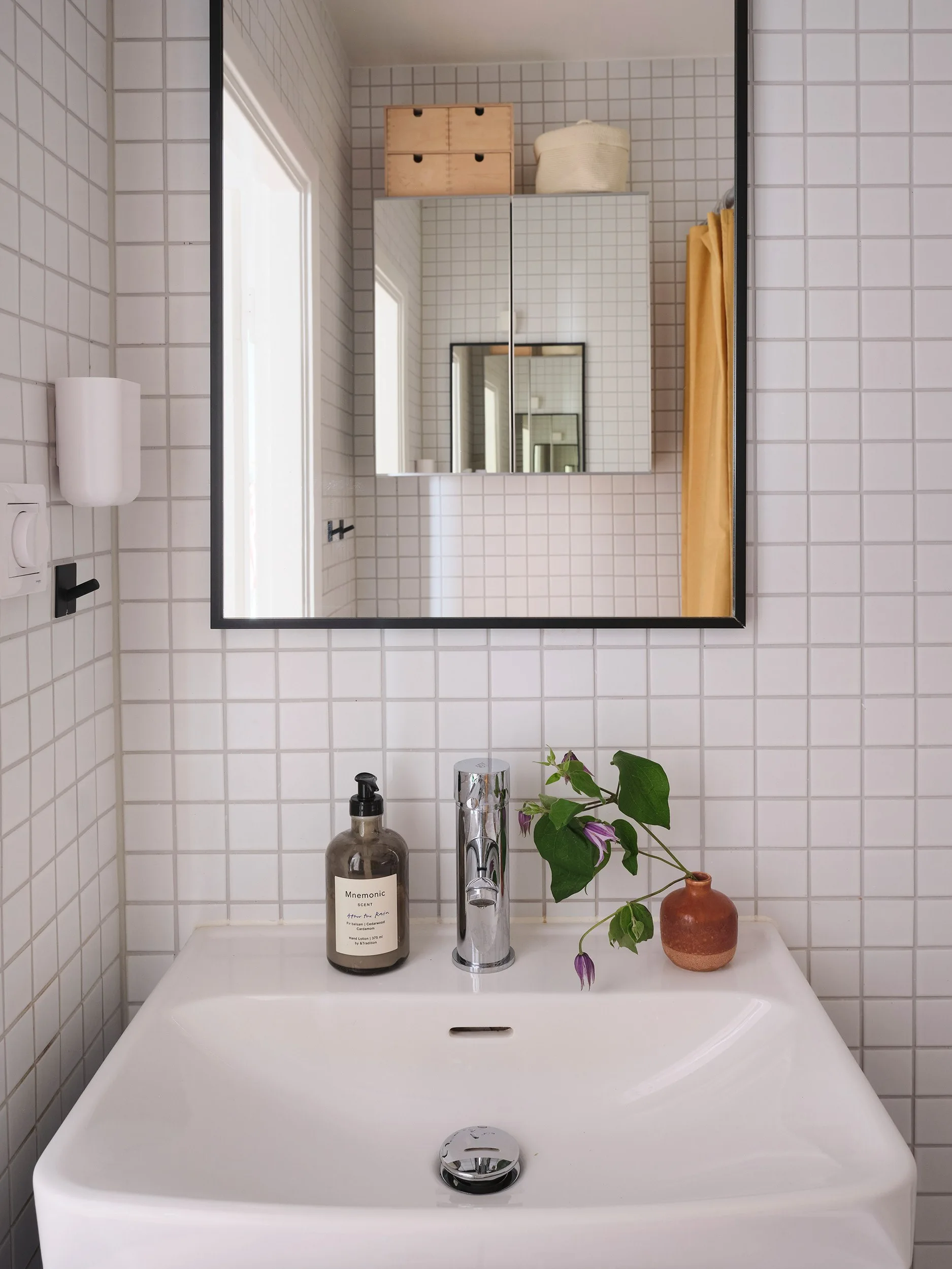 small format white tiled bathroom