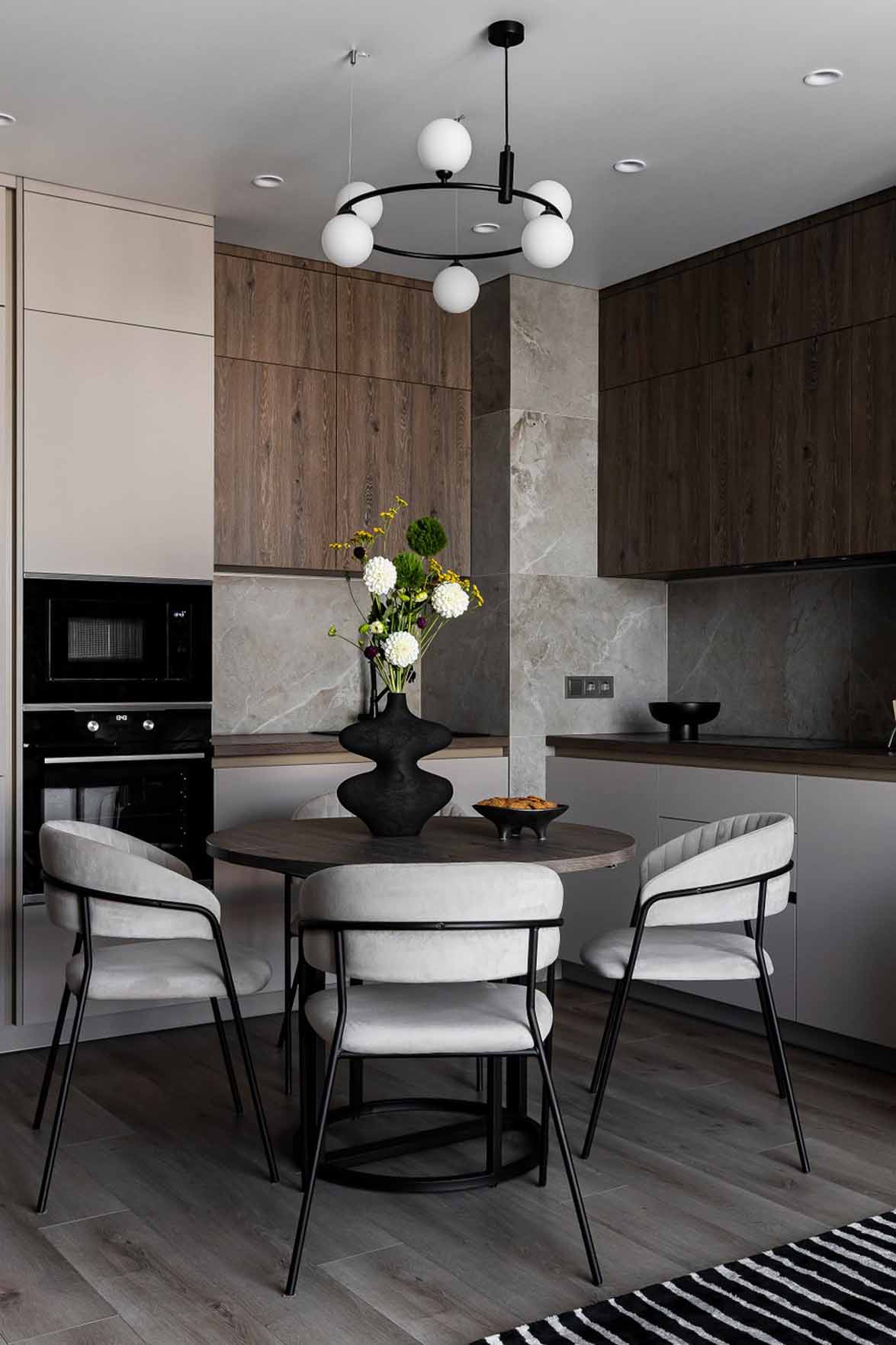 cuisine ouverte et coin repas tapis noir et blanc appartement de 60m2 neutre cuisine ouverte et coin repas tapis noir et blanc appartement de 60m2 neutre