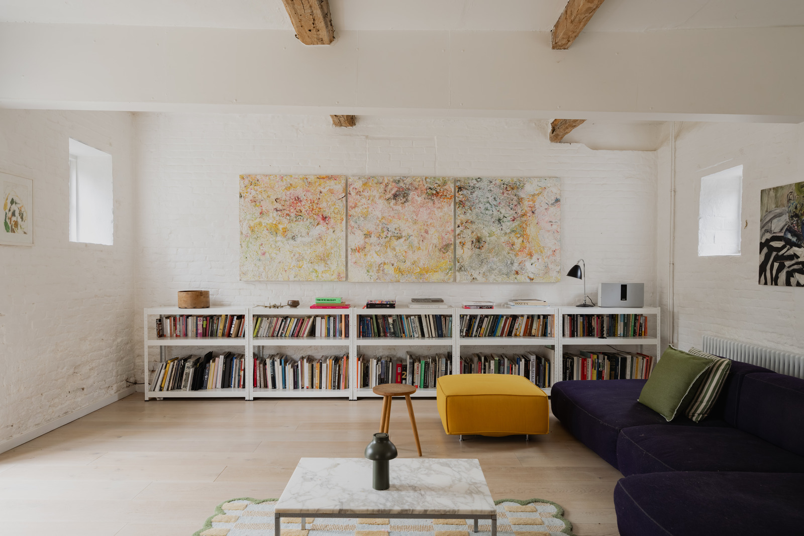 Living room with bleached bricks vintage decor renovated 18th-century house in the English countryside Living room with bleached bricks vintage decor renovated 18th-century house in the English countryside