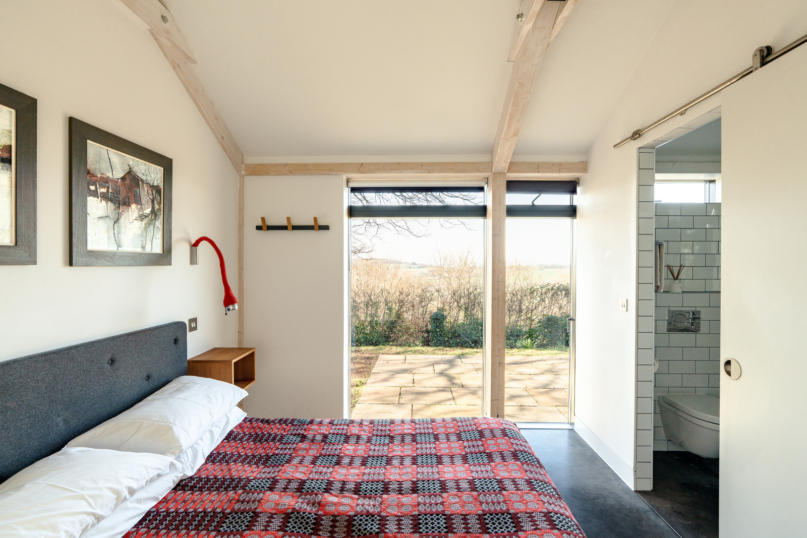 bedroom minimalist decor concrete floor Welsh home