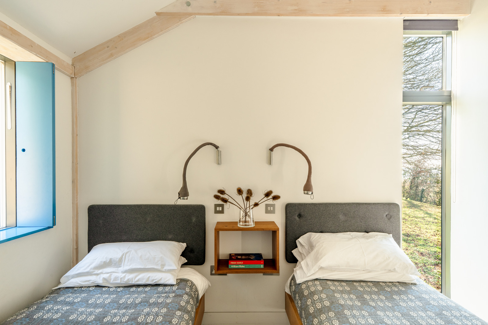 bedroom minimalist decor concrete floor Welsh home