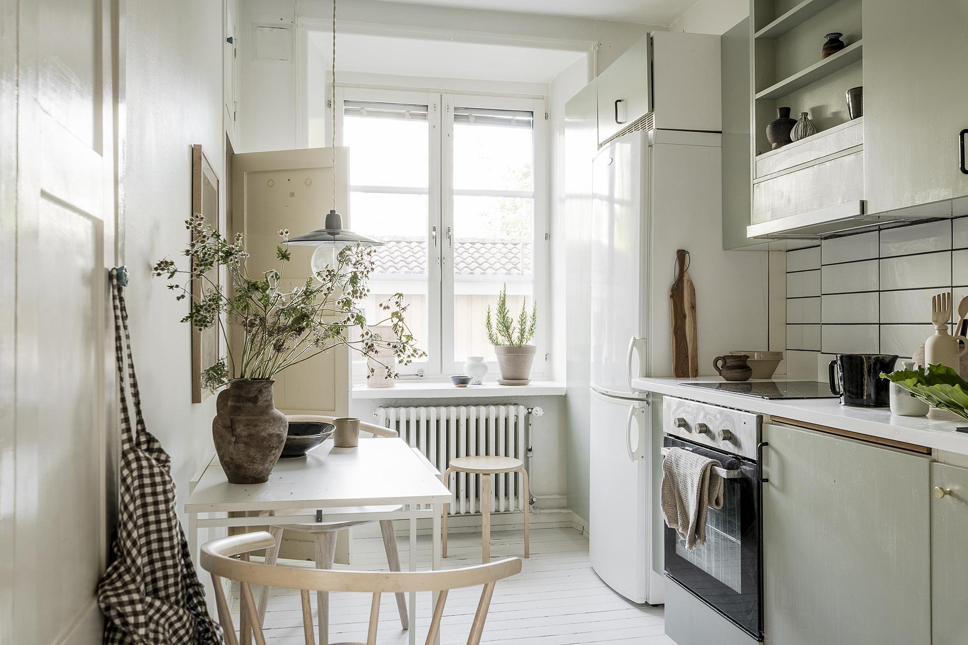 pale green kitchen scandinavian style with dining room