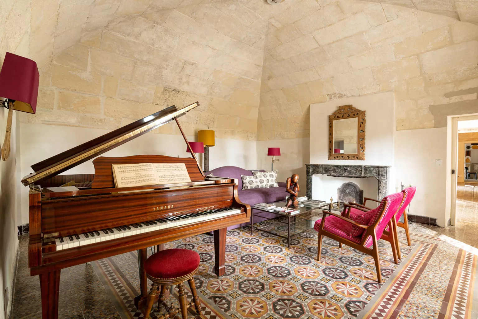 vaulted living room withe period fireplace and piano stone farmhouse in Provence vaulted living room withe period fireplace and piano stone farmhouse in Provence