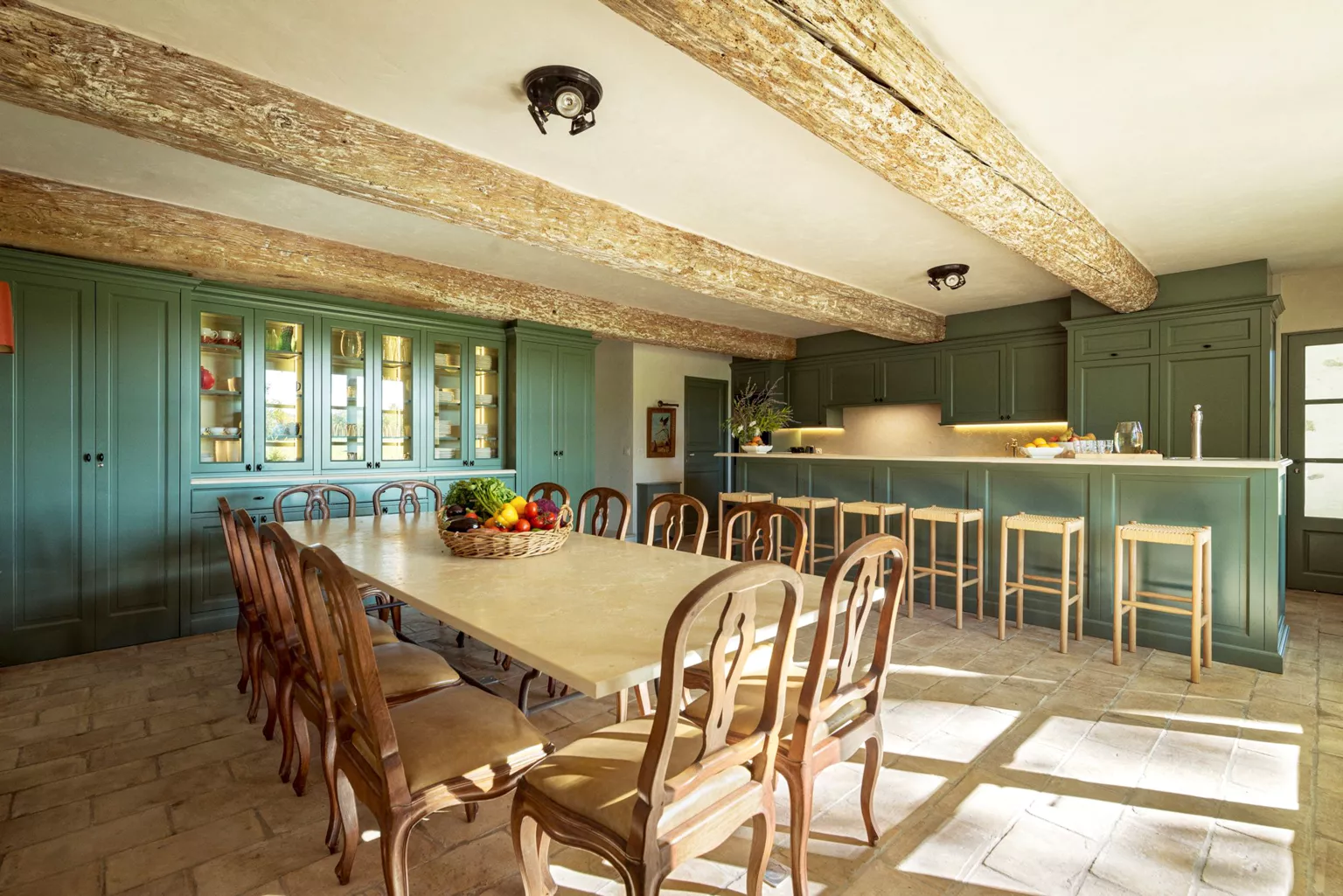 dining room and green kitchen with beams stone farmhouse in Provence dining room and green kitchen with beams stone farmhouse in Provence