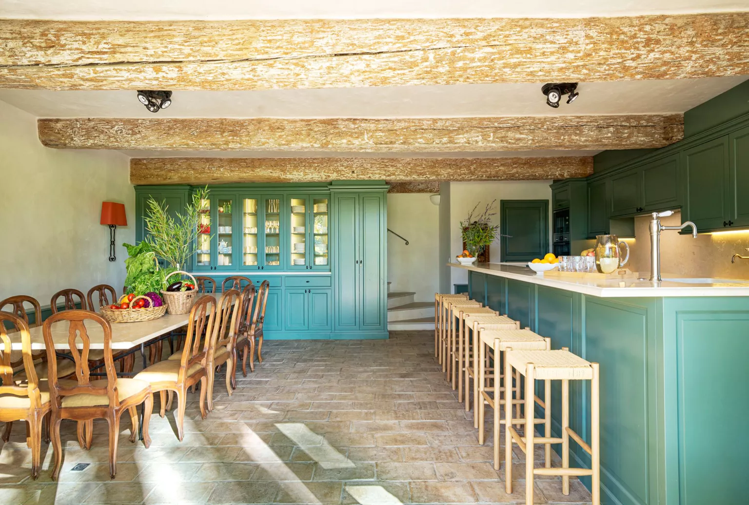dining room and green kitchen with beams stone farmhouse in Provence dining room and green kitchen with beams stone farmhouse in Provence