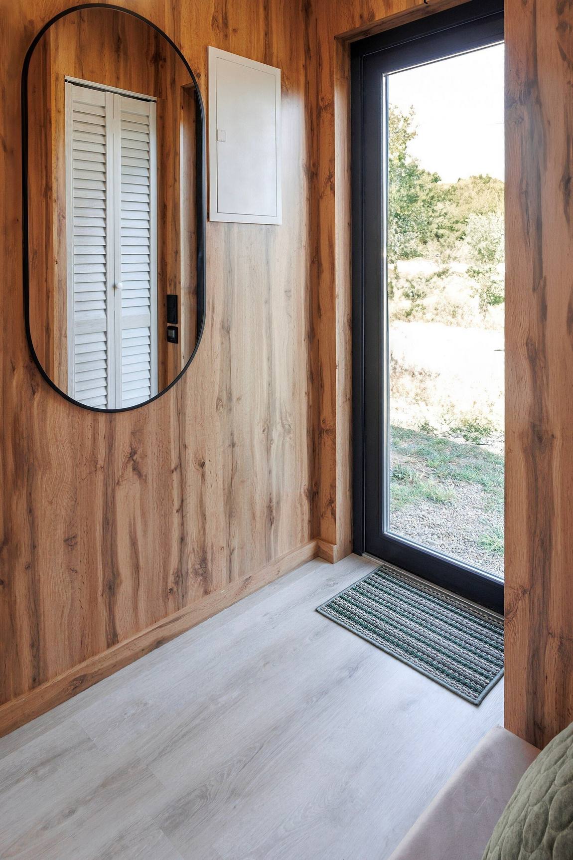 wooden wall with mirror tiny house entrance wooden wall with mirror tiny house entrance
