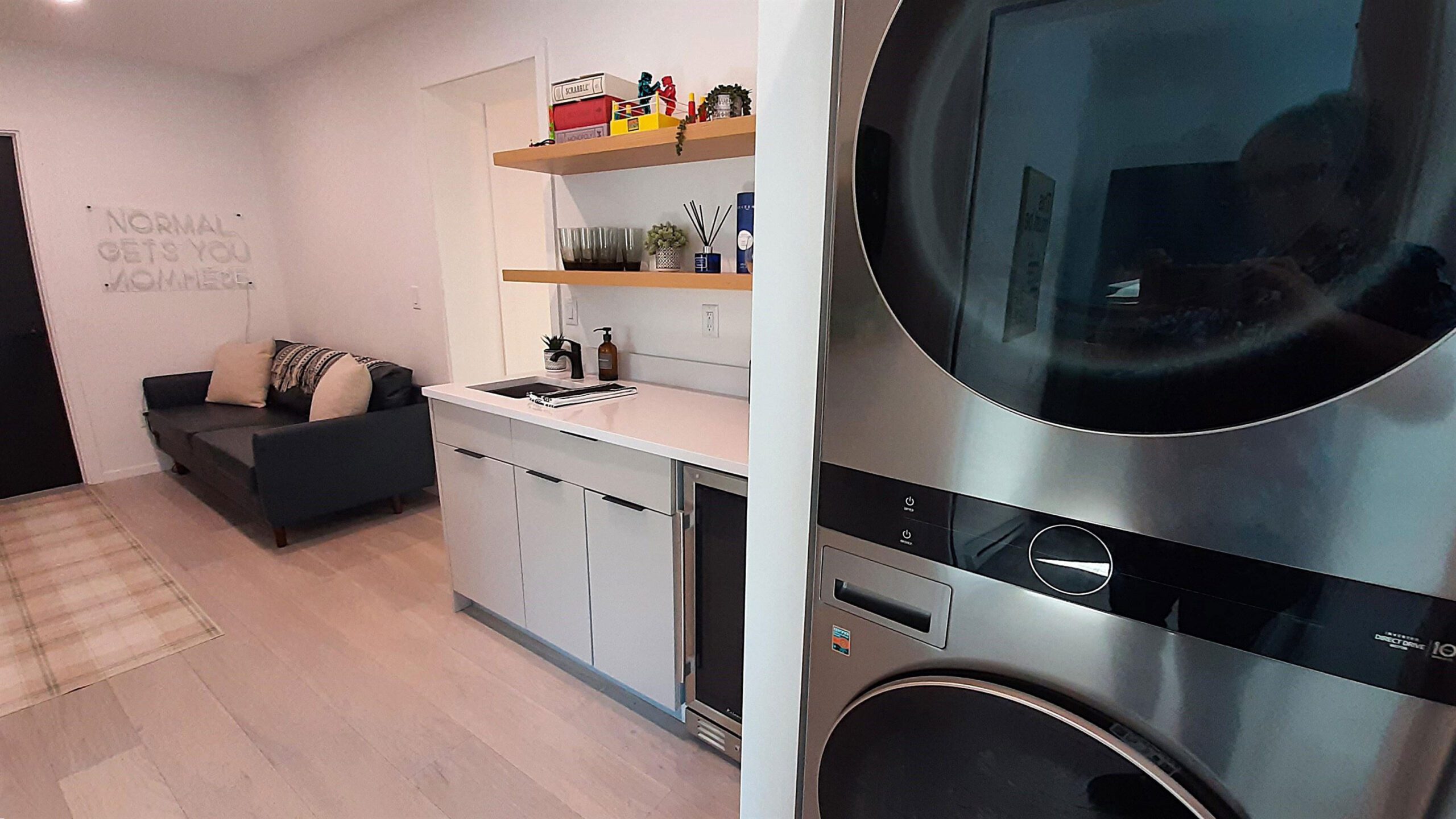 small kitchen and living room with laundry small kitchen and living room with laundry
