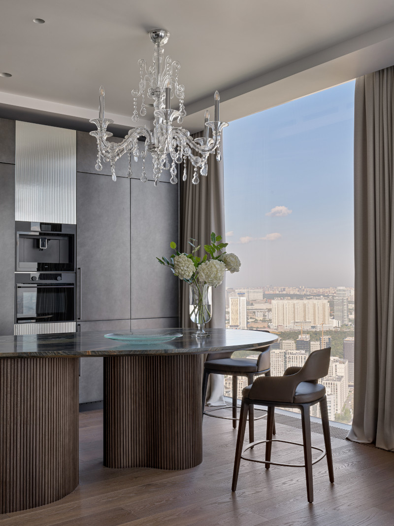 cuisine ouverte couleur noyer avec baies vitrées panoramiques décoration contemporaine