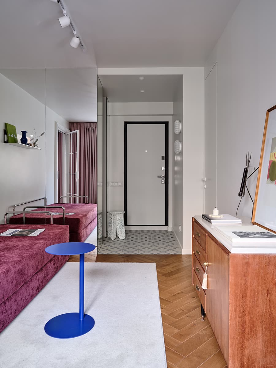 living room with mirror and pink sofa 38sqm apartment contemporary decor
