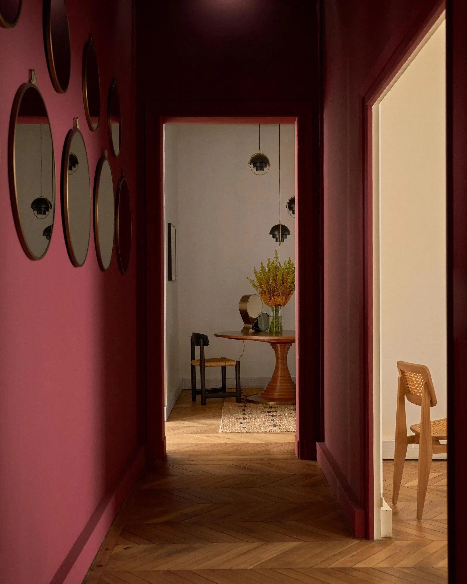 red entryway Haussmann-style apartment in Paris by Gubi