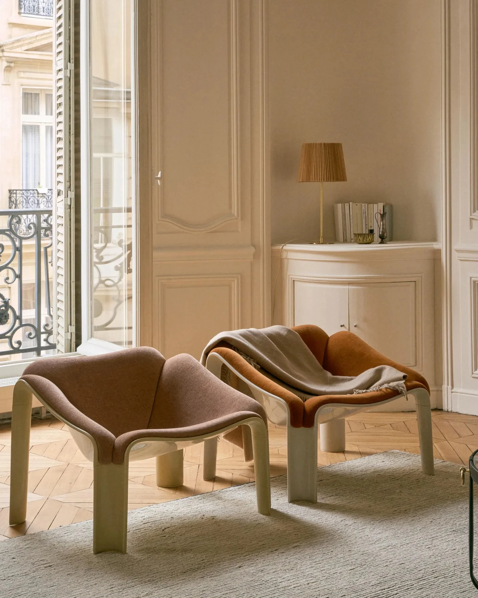 living room Pierre Paulin armchairs Haussmann-style apartment in Paris by Gubi