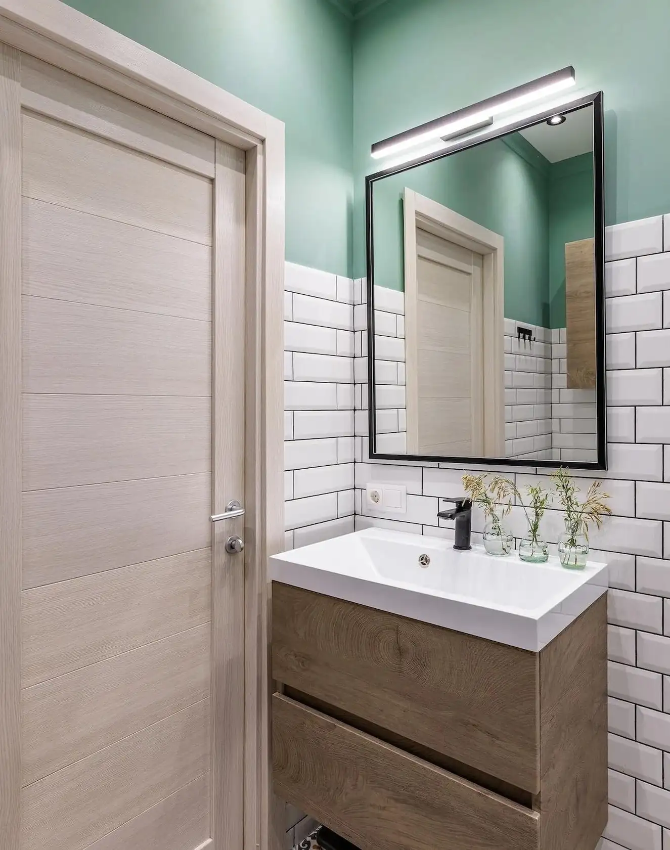 salle de bain verte sol carreaux vintage carrelage métro blanc décoration contemporaine studio 39m2