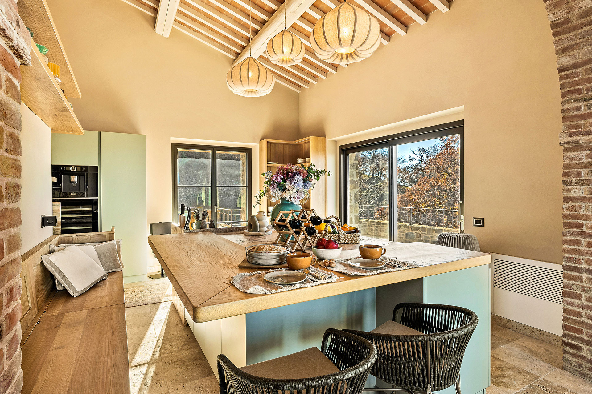 green kitchen with beams stone house with pool La Torre Umbria