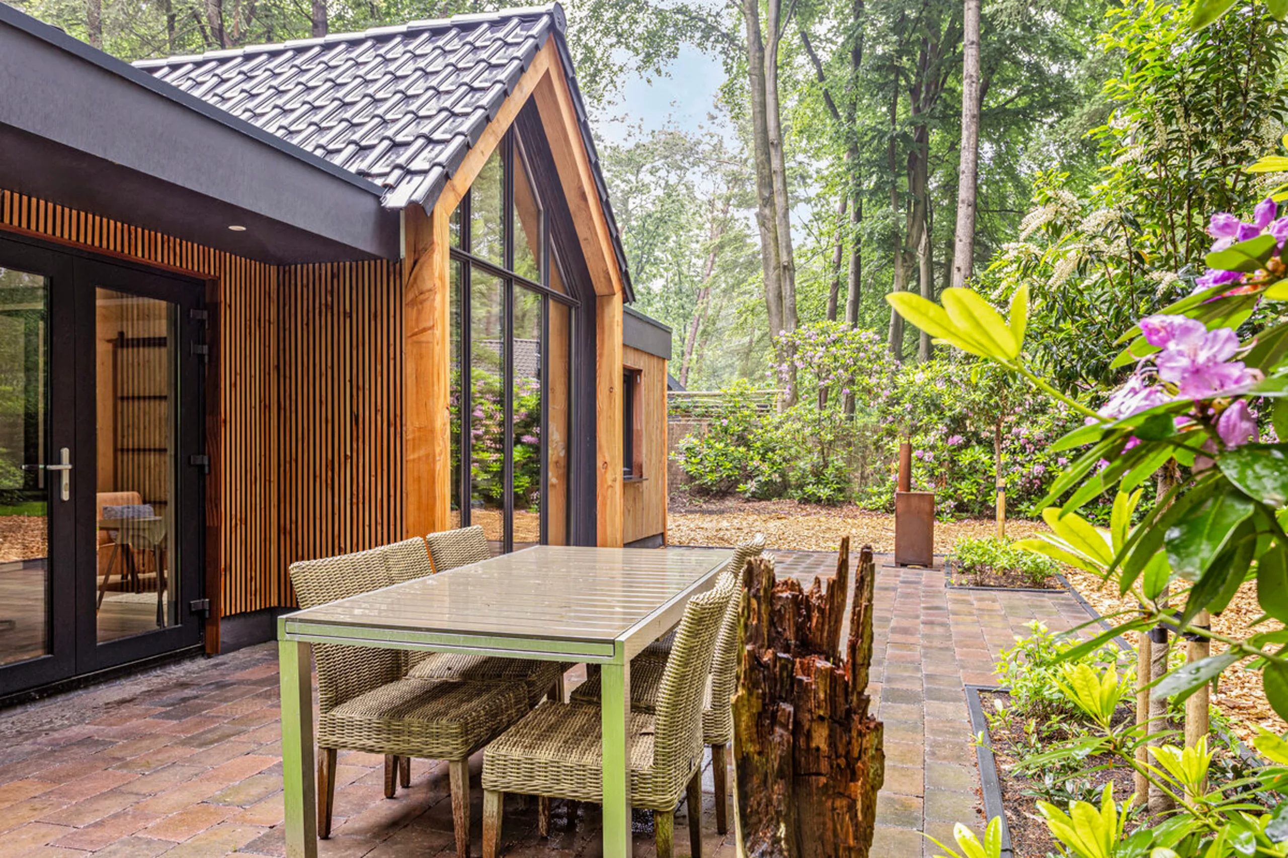 wooden house with lush garden in the Netherlands wooden house with lush garden in the Netherlands