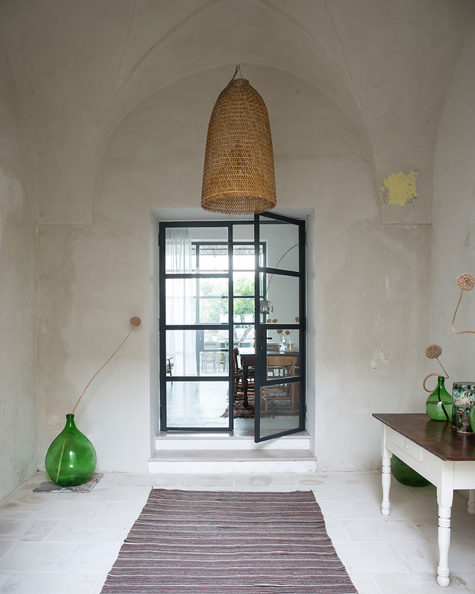 entryway with arches renovated historic townhouse in Puglia modern decor