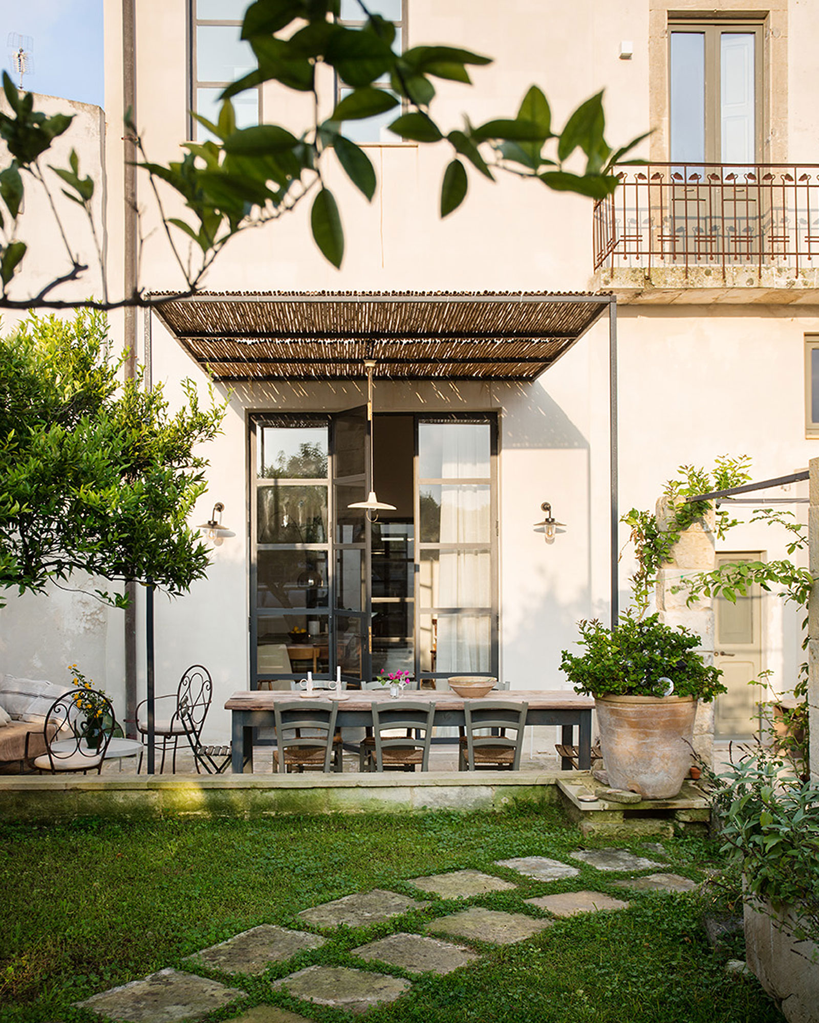 terrace with pergola renovated historic townhouse in Puglia