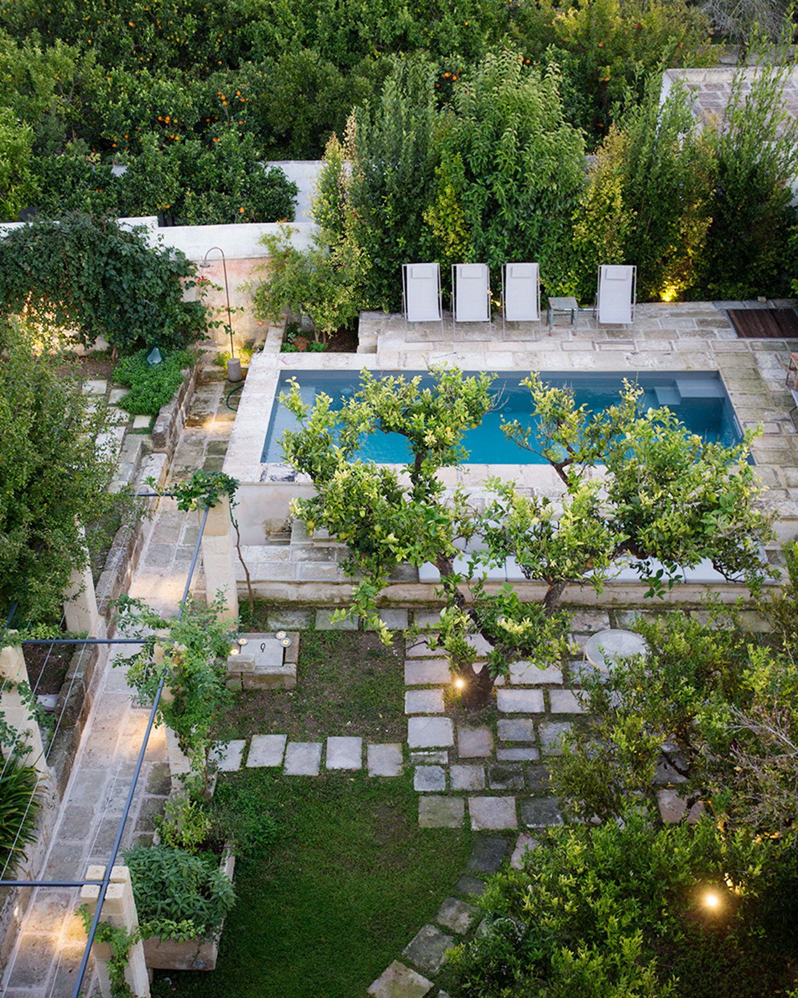 pool in the garden of a renovated historic townhouse in Puglia