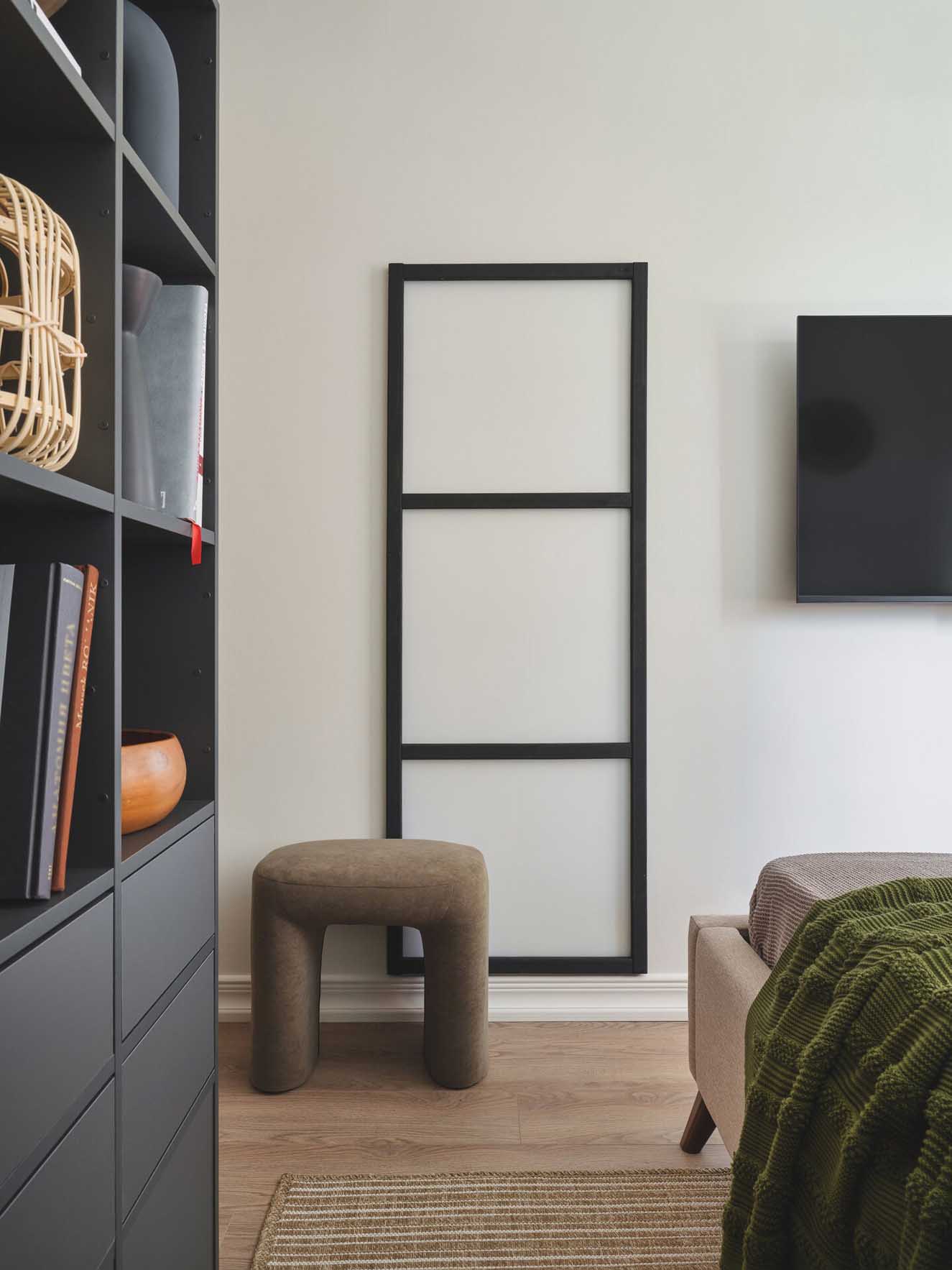 bedroom contemporary decor with TV on the wall